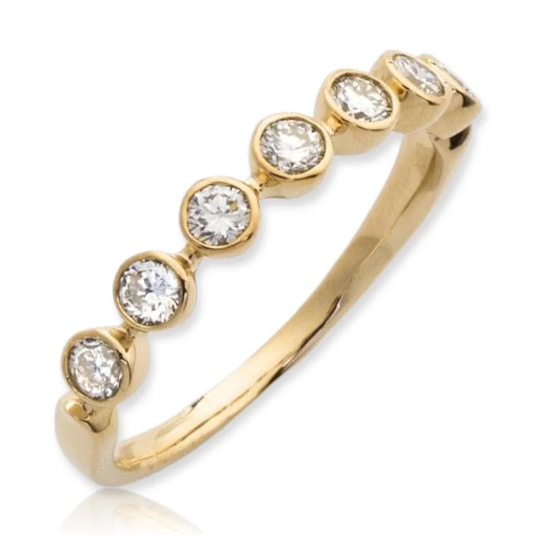 14KY 0.50CTW DIAMOND BAND - 7 STONE BEZEL SET