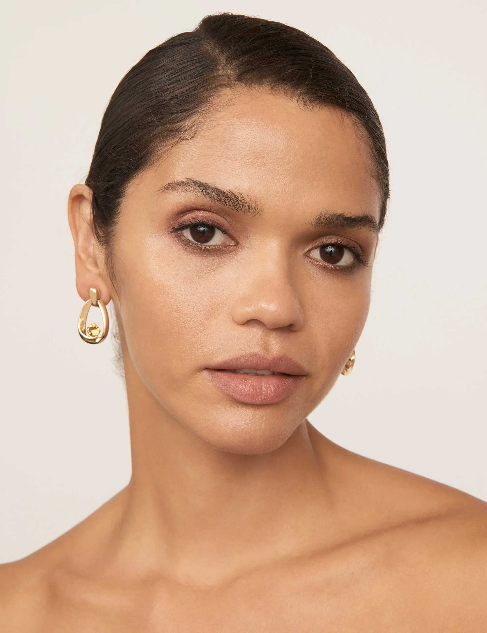 CRADLE STONE CLIP EARRINGS
