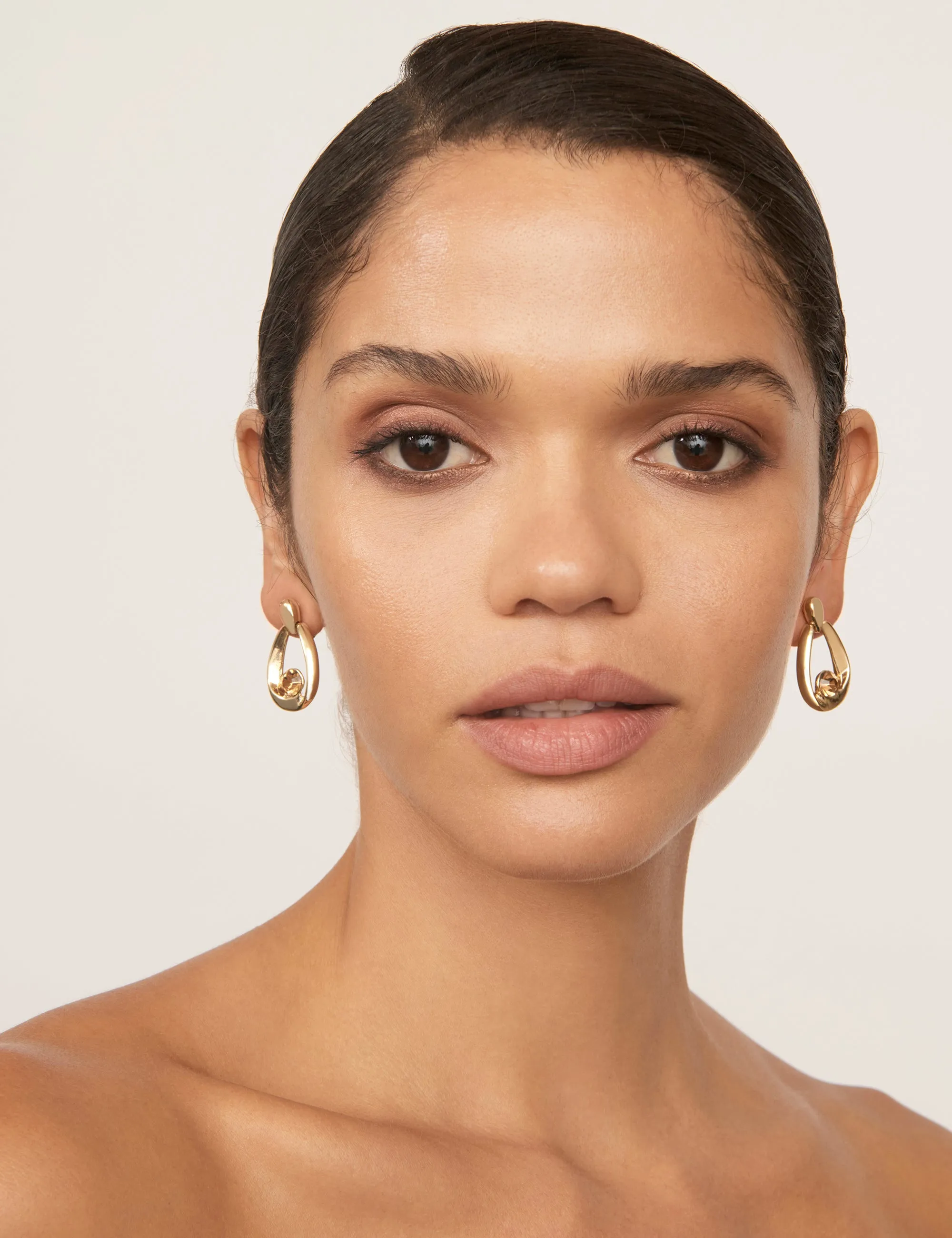 CRADLE STONE CLIP EARRINGS