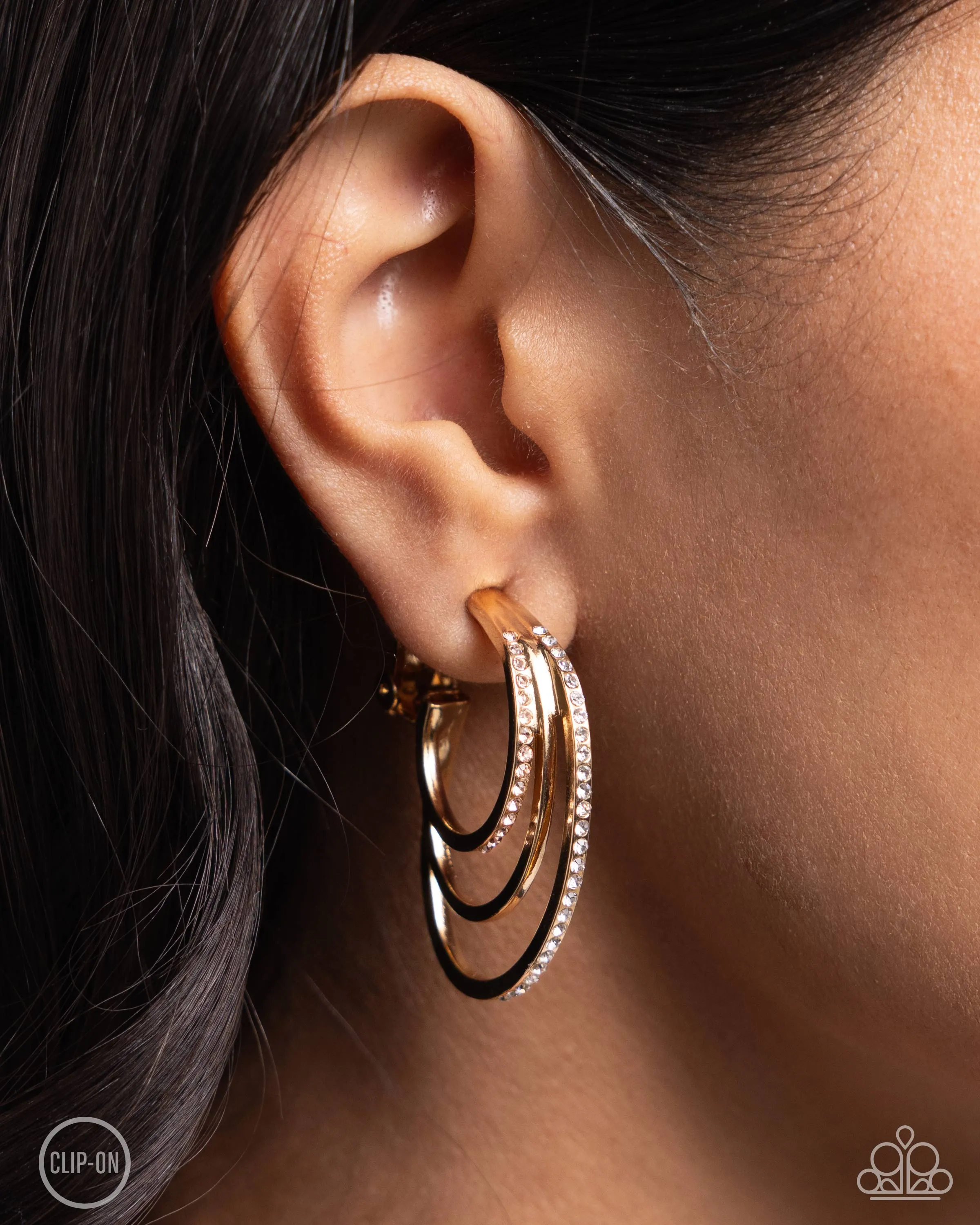 Paparazzi Triad Trek - Gold Clip On Earrings