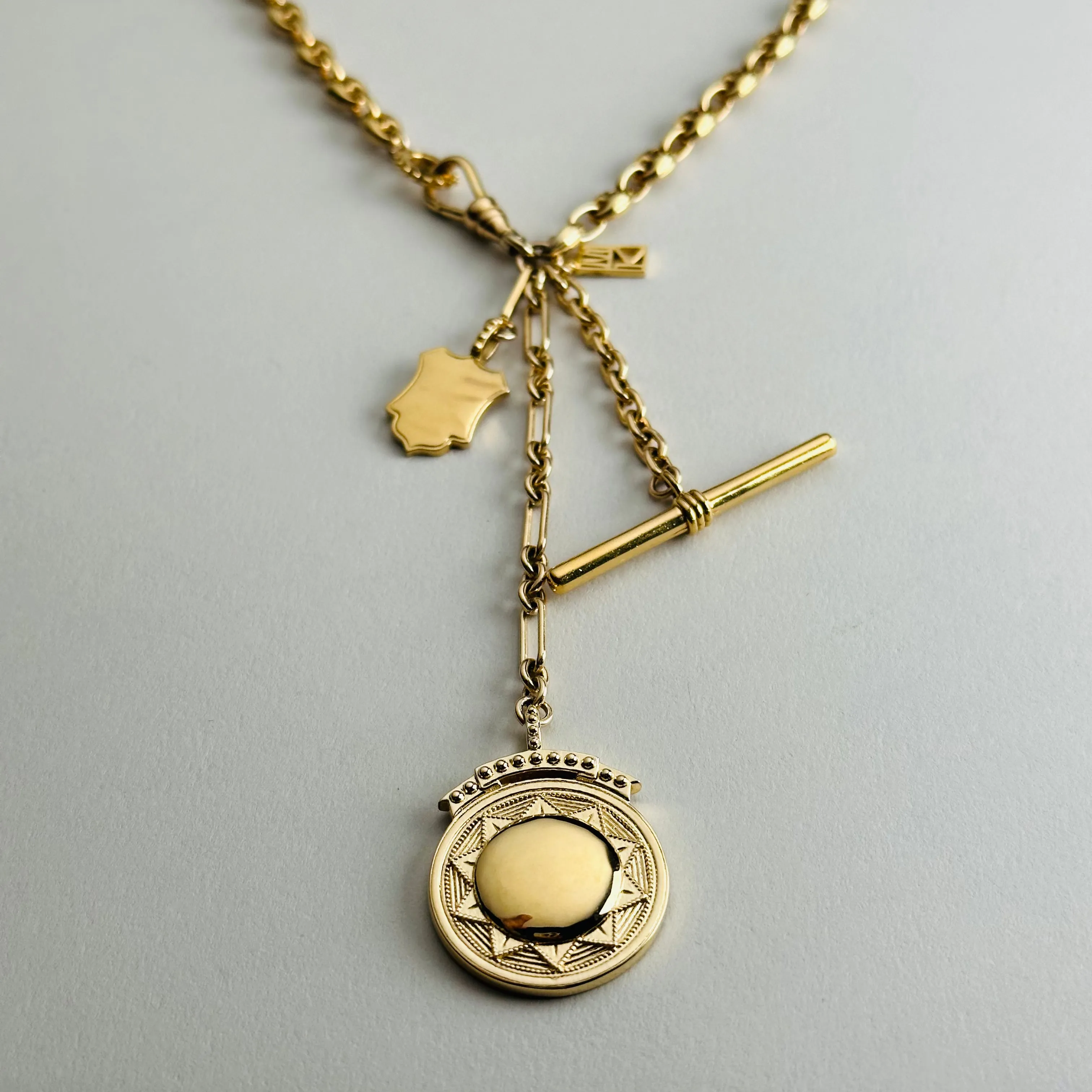 Puffy Mariner Sundial   Shield Fob Necklace