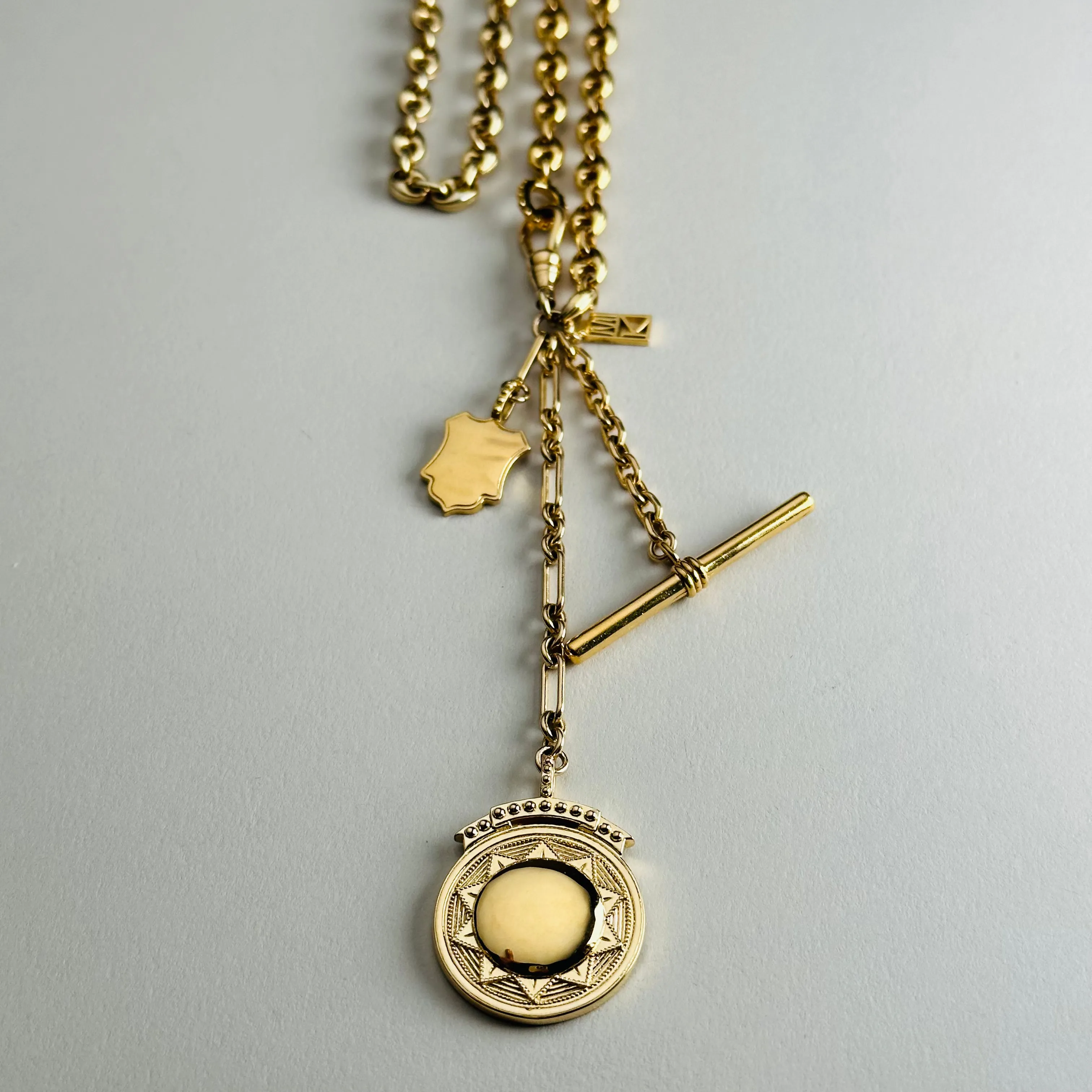 Puffy Mariner Sundial   Shield Fob Necklace